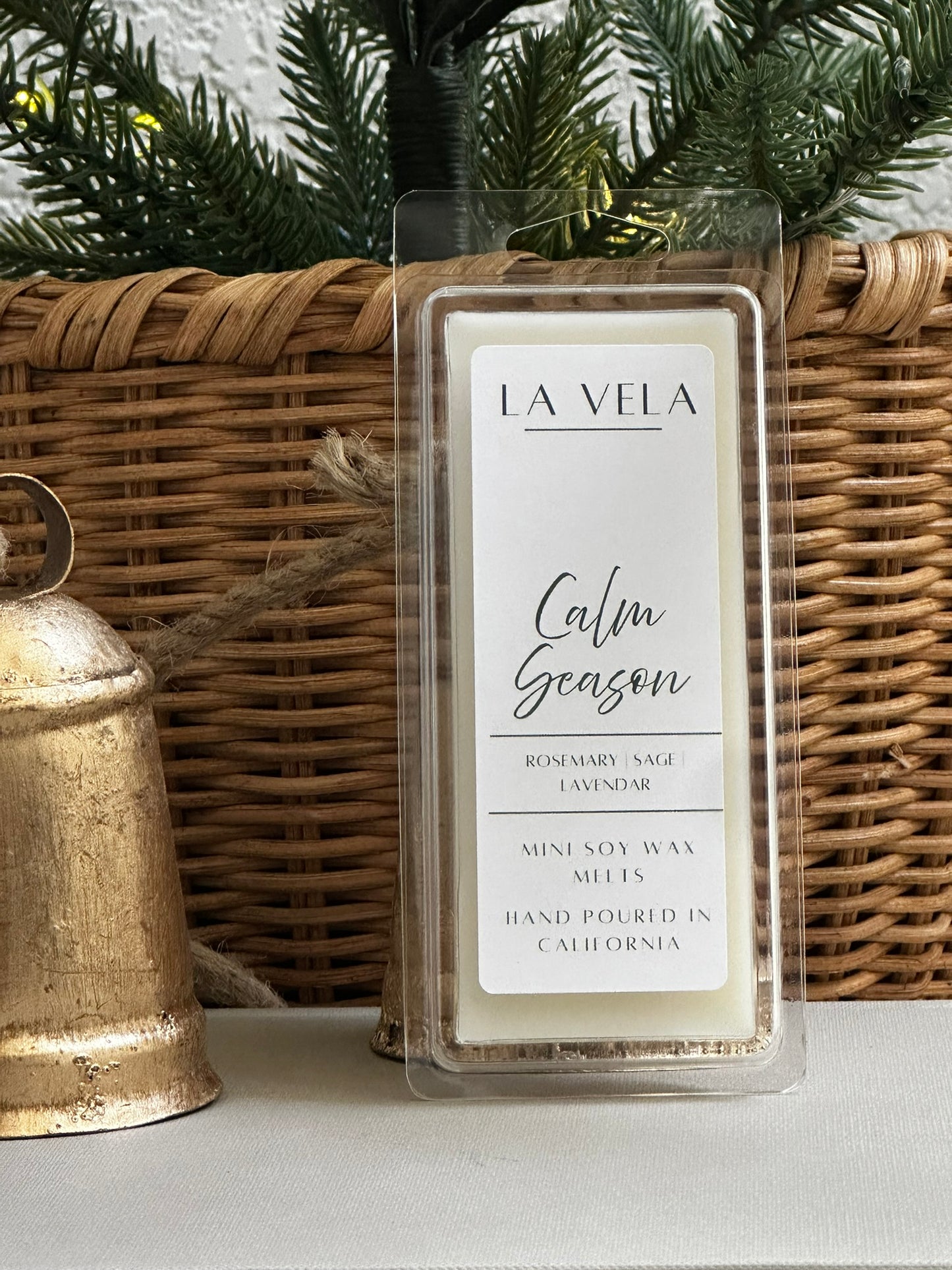 La Vela wax melt packaging with a Christmas-themed background